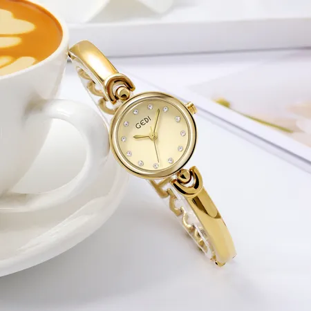 Gold bangle outlet watch for ladies