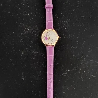 Lady's quartz watch with stone on dial